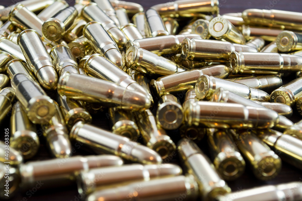 Naklejka premium Golden pistol bullets