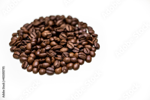 Coffee beans in the shape of a circle. white background.