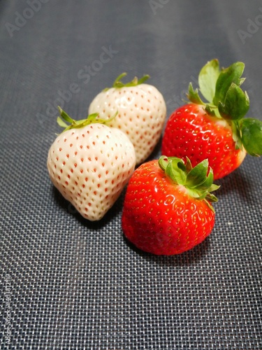 White strawberries and red strawberries