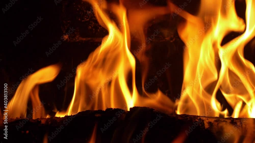 Burning Log Fire Flames in Fireplace Close-up Slow Motion Burning Log Fire Flames in Fireplace Close-up Slow Motion