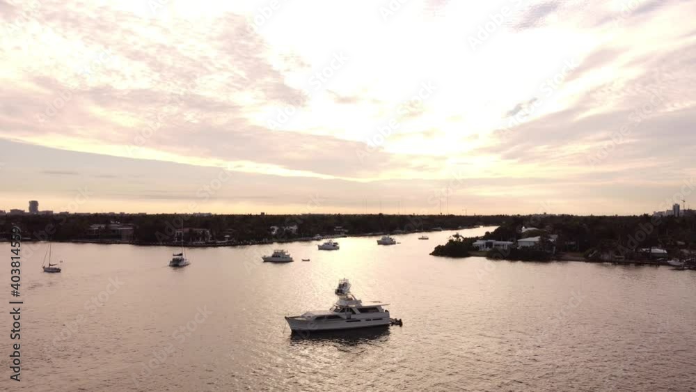 Aerial video rising boats in the lake at sunset Aerial video rising boats in the lake at sunset