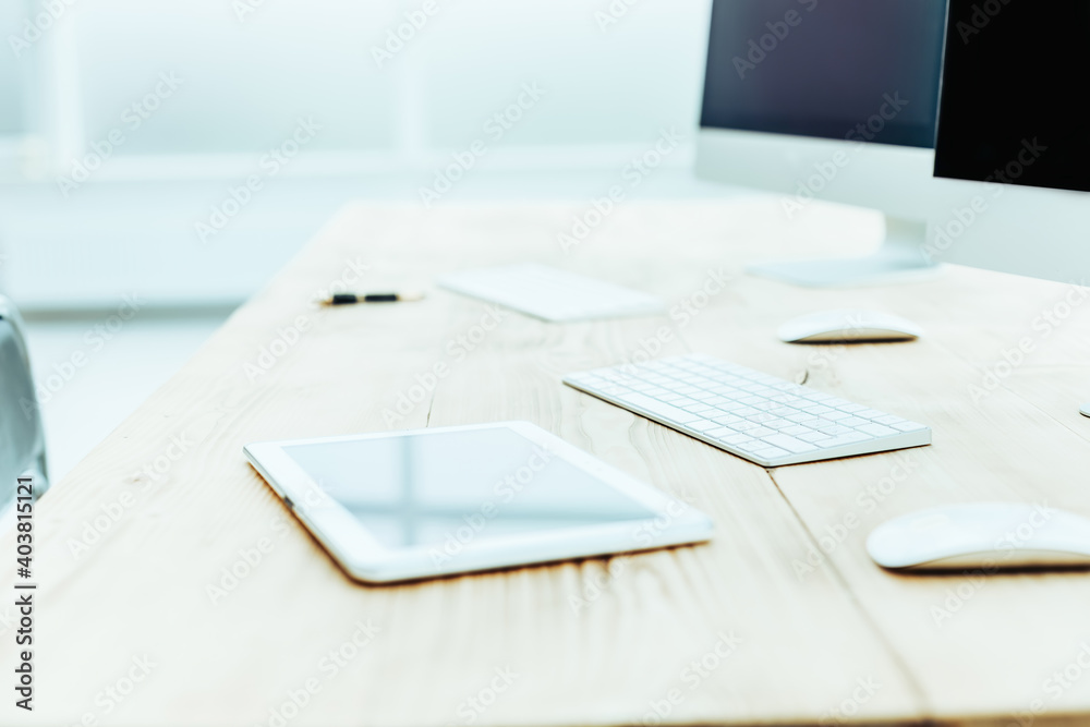 close up. digital tablet on the desktop of a businessman close up. digital tablet on the desktop of a businessman