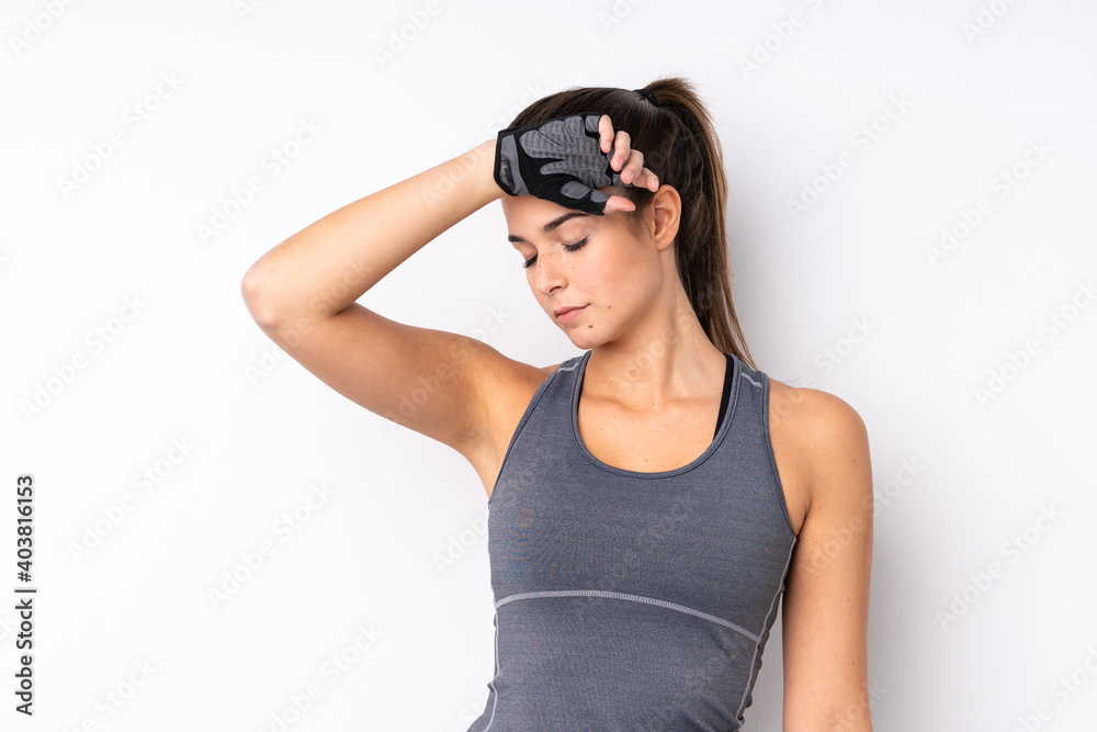 Teenager Brazilian sport girl over isolated white background with tired expression Teenager Brazilian sport girl over isolated white background with tired expression