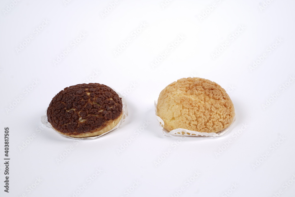 French traditional Choux pastry ball. Choux with filling chantilly cream. Fresh golden profiterole or Pate a choux. Selective focus. Cream Puffs, choco vanilla Choux isolated on white background.
French traditional Choux pastry ball. Choux with filling chantilly cream. Fresh golden profiterole or Pate a choux. Selective focus. Cream Puffs, choco vanilla Choux isolated on white background.