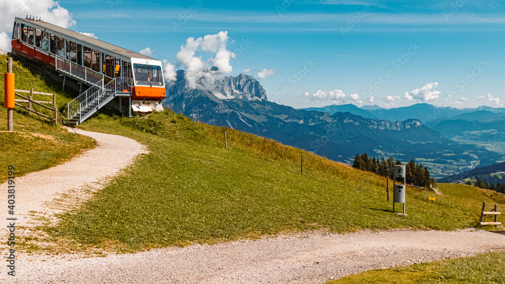 Beautiful alpine summer view with an old rack railway at the famous Hartkaiser summit, Ellmau, Wilder Kaiser, Tyrol, Austria