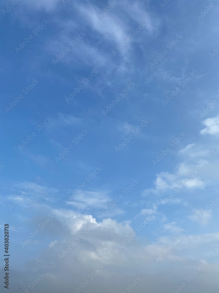 Bright Blue Sky with Clouds