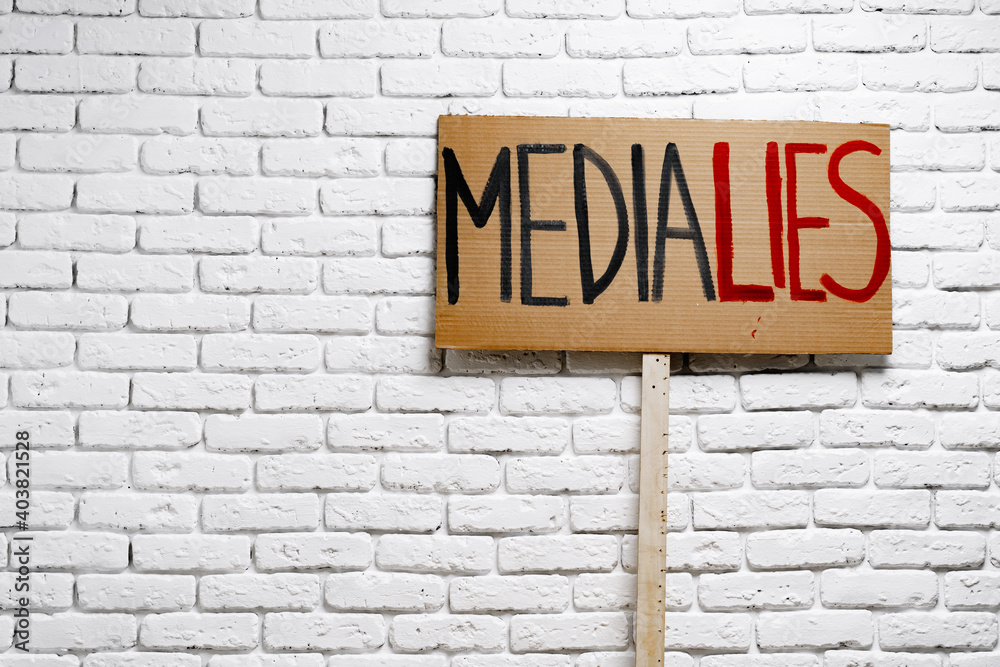 Protest placard against fake news about outbreak 2019-nCoV and treatment Protest placard against fake news about outbreak 2019-nCoV and treatment