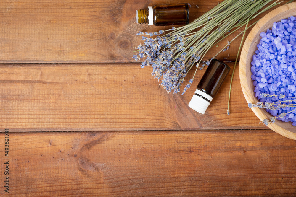 Obraz premium bowl of lavender bath salt and massage oil