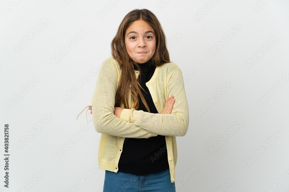 Little girl over isolated white background making doubts gesture while lifting the shoulders Little girl over isolated white background making doubts gesture while lifting the shoulders