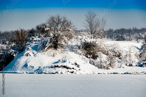 Wallpaper Mural Spacious snow landscape. River and hills in Russia, white winter on the terrain, a lot of fluffy snow and ice Torontodigital.ca