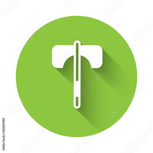 White Medieval axe icon isolated with long shadow. Battle axe, executioner axe. Medieval weapon. Green circle button. Vector.