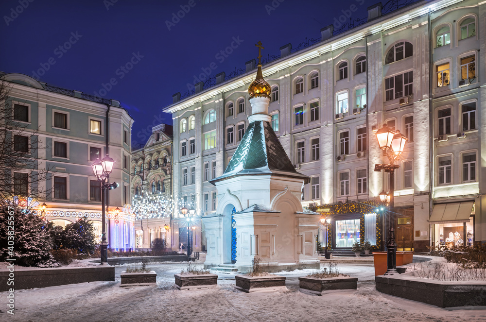 Chapel of the Nativity of the Virgin and lanterns in Stoleshnikov Lane in Moscow