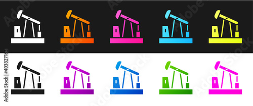 Set Oil pump or pump jack icon isolated on black and white background. Oil rig. Vector.