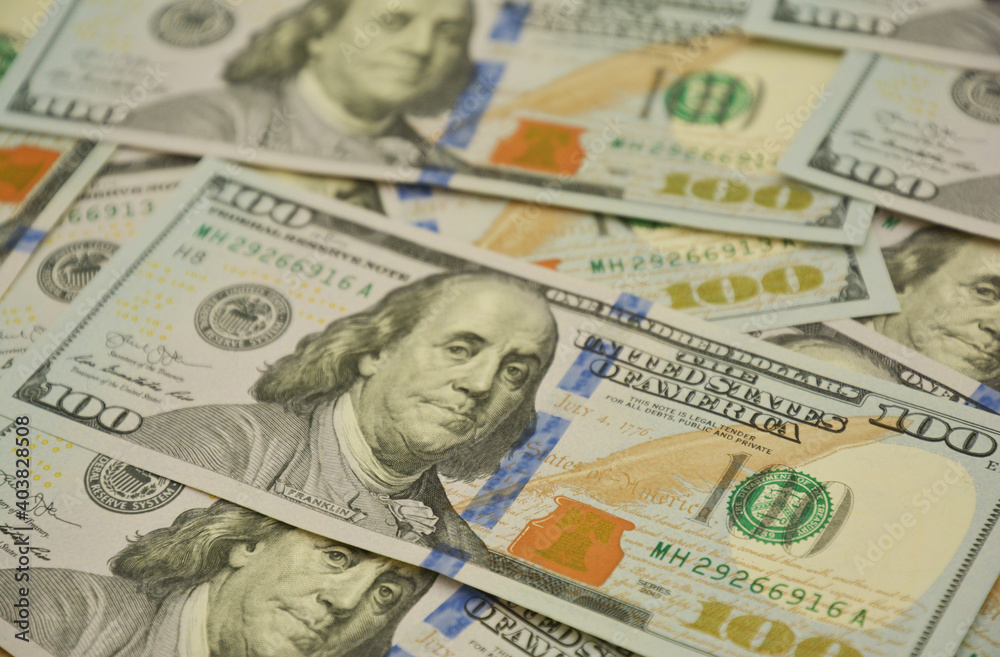 Money banknotes background, one hundred United States dollar bills as a a world global reserve currency. Money banknotes background, one hundred United States dollar bills as a a world global reserve currency.