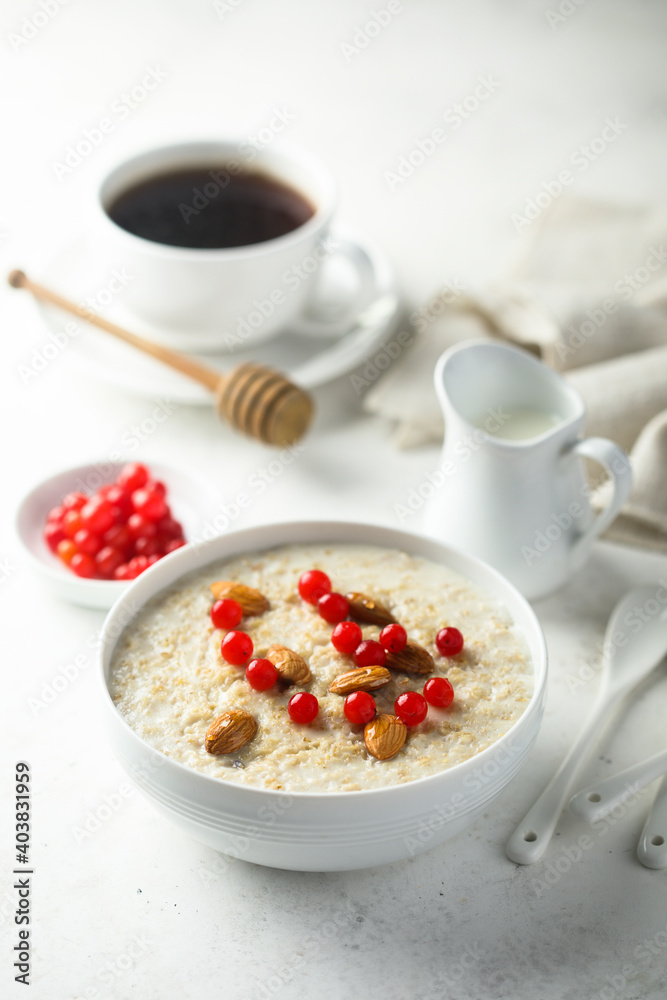 Healthy oatmeal porridge with berries and almond Healthy oatmeal porridge with berries and almond