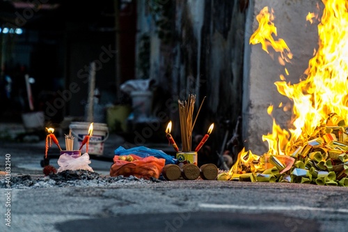 Burning offerings during the Hungry Month Festival