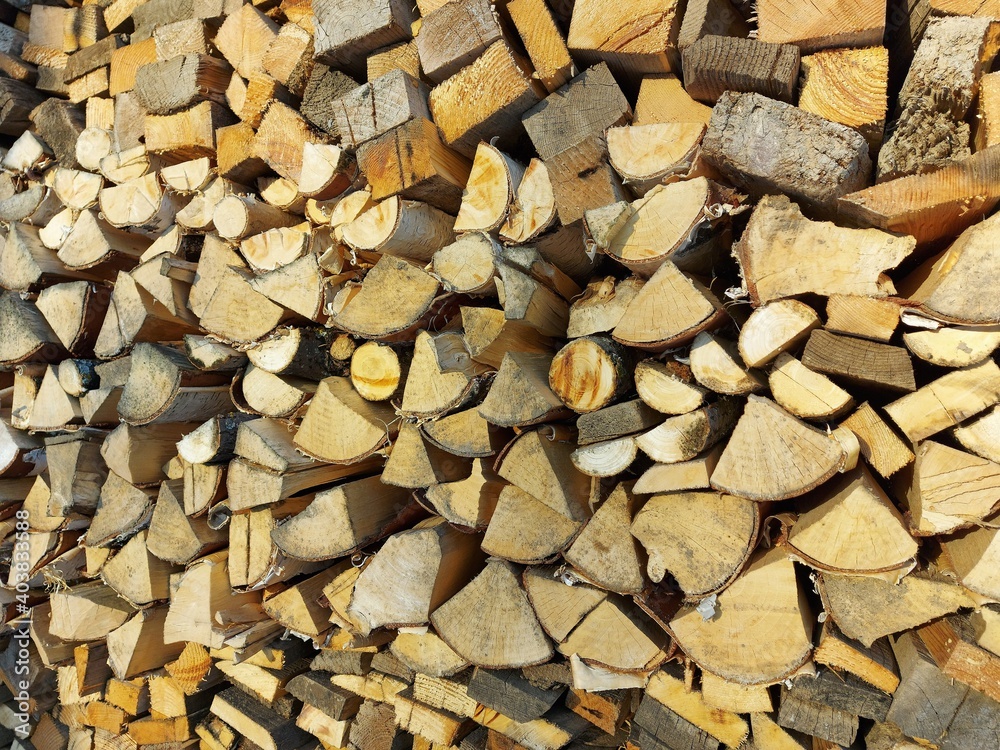 The ends of straight sawn boards. Natural wood background The ends of straight sawn boards. Natural wood background