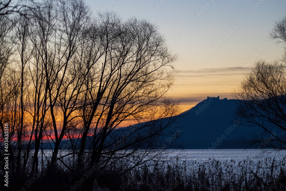 Naklejka premium Nove Mlyny reservoir and Palava hills during sunrise in winter, Southern Moravia, Czech Republic