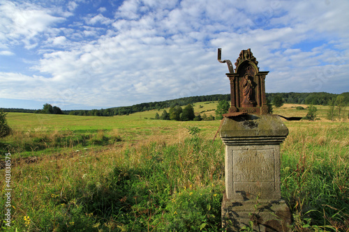 Fototapeta Naklejka Na Ścianę i Meble -  Old roadside shrine in Jasiel - former and abandoned village in Low Beskids, Poland