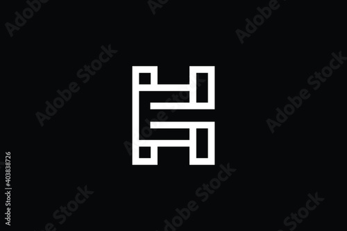 EH logo letter design on luxury background. HE logo monogram initials letter concept. EH icon logo design. HE elegant and Professional letter icon design on black background. H E EH HE