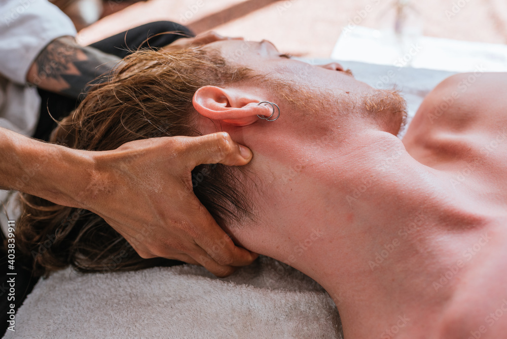 Man Receiving Relaxing Neck Massage Man Receiving Relaxing Neck Massage