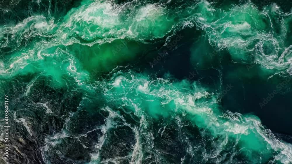 Waves of water of the river and the sea meet each other during high tide and low tide. Waves of water of the river and the sea meet each other during high tide and low tide.