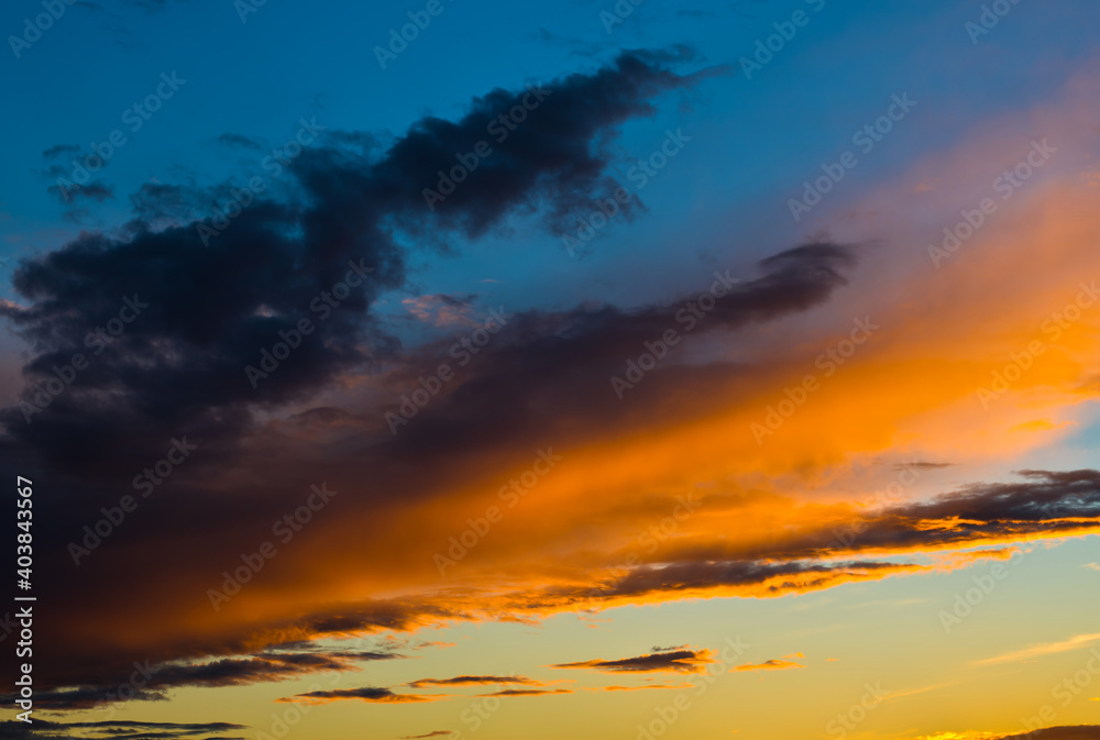 Sunset sky with beautiful  black and orange clouds
