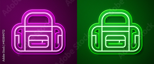Glowing neon line Sport bag icon isolated on purple and green background. Vector.