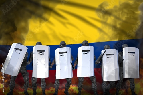 Wallpaper Mural Colombia protest fighting concept, police special forces in heavy smoke and fire protecting government against revolt - military 3D Illustration on flag background Torontodigital.ca