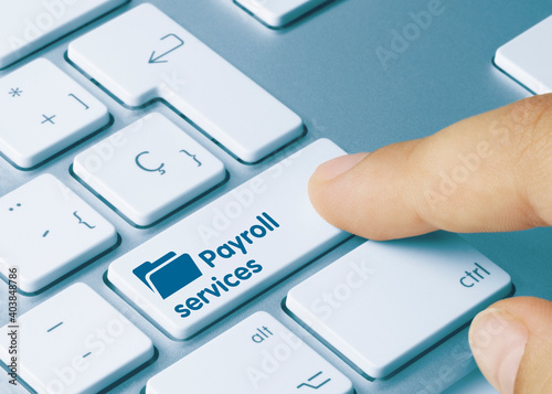 Payroll services - Inscription on Blue Keyboard Key.