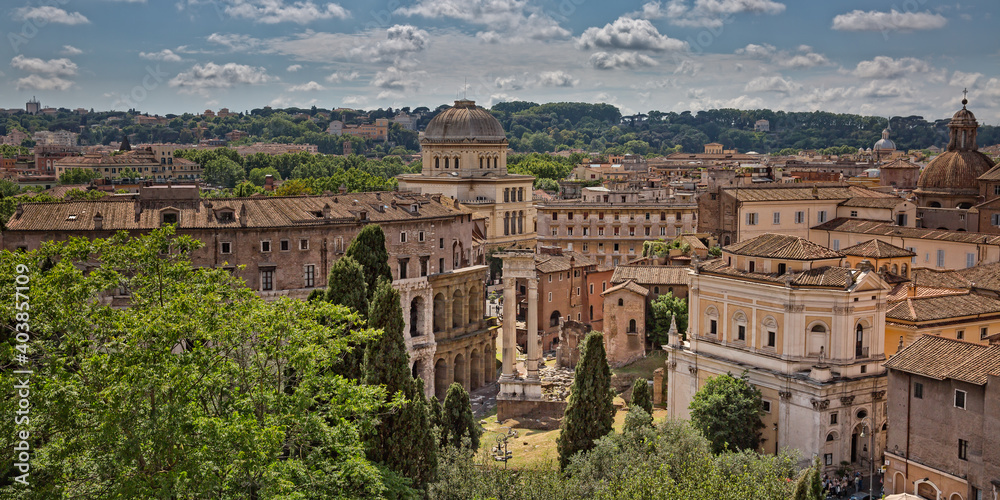 City skyline with landmarks of the Ancient Rome. View of the ruins of the Teatro di Marcello in Rome city center, Italy