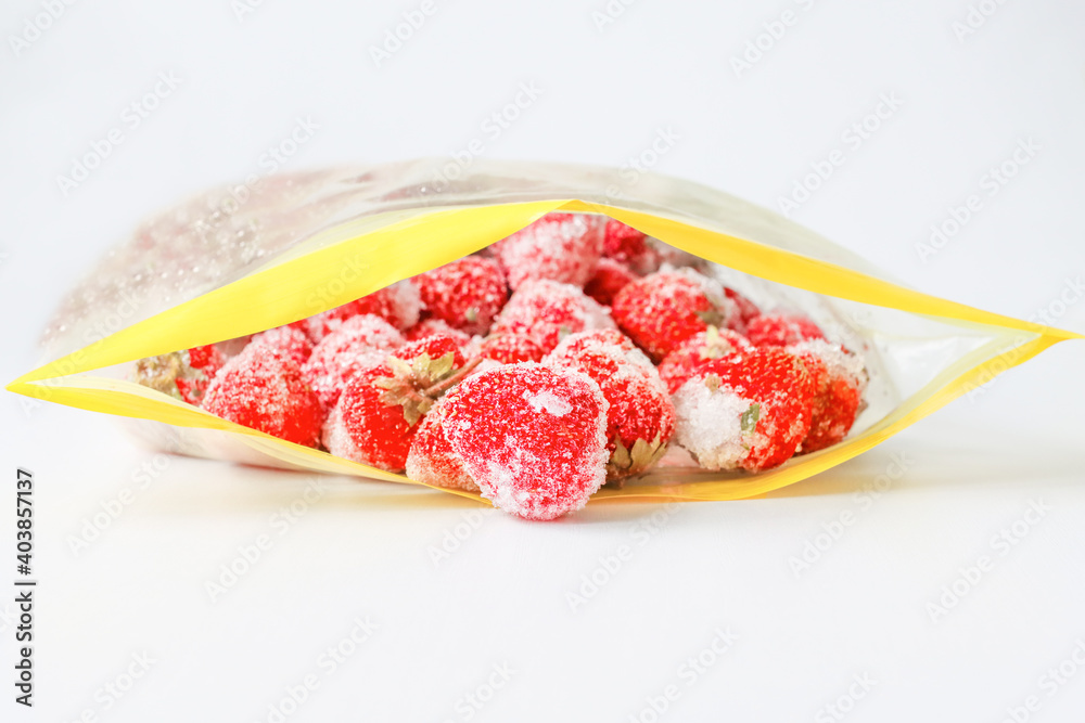 Package for freezing food together with frozen strawberries. Package for freezing food together with frozen strawberries.