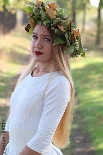 Portrait of the beautiful blond  girl  on the nautre