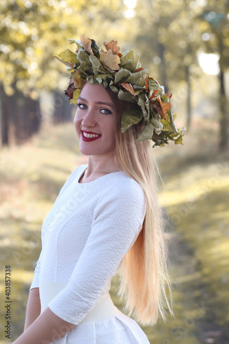 Portrait of the beautiful blond  girl  on the nautre