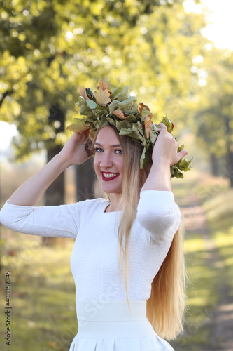 Portrait of the beautiful blond  girl  on the nautre