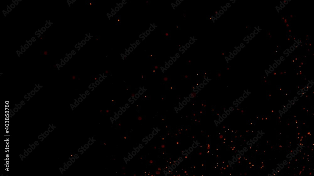 Super slow motion of fire sparks isolated on black background. Filmed on high speed camera, 1000 fps