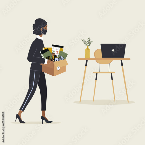 Concept of employee arrival to a new job due to virus pandemic. Young african woman in protective mask come to workplace carrying cardboard box with stationery and belongings.Vector illustration