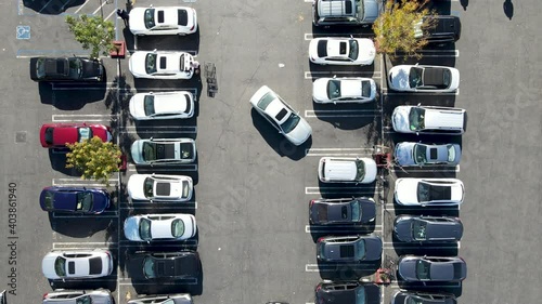 Aerial top view of parking lot with many cars from above, city transportation and urban concept 