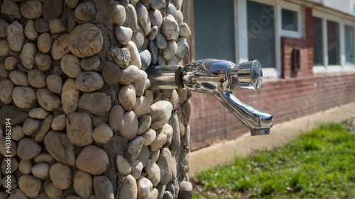 Bild auf Leinwand Drinking tap water in the nature.