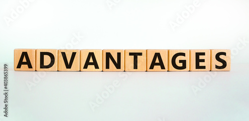 Advantages symbol. Concept word 'advantages' on wooden cubes on a beautiful white background. Business and advantages concept, copy space.