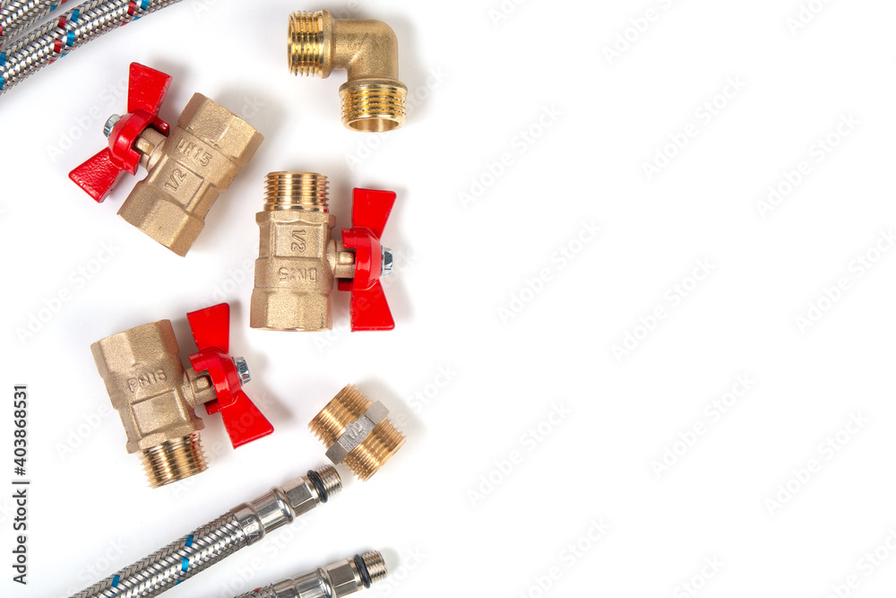 Plumbing gate ball vales, flexible water hose and fittings. Copy space Plumbing gate ball vales, flexible water hose and fittings. Copy space