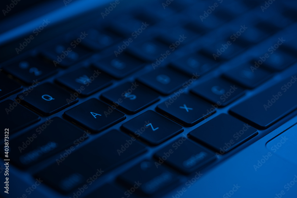 Macro shot view of laptop keyboard . Concept of working, writing e-mails, using Internet. Macro shot view of laptop keyboard . Concept of working, writing e-mails, using Internet.