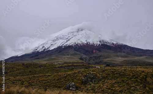 The Cotopaxi volcano in the clouds, Cotopaxi National Park, Ecuador
