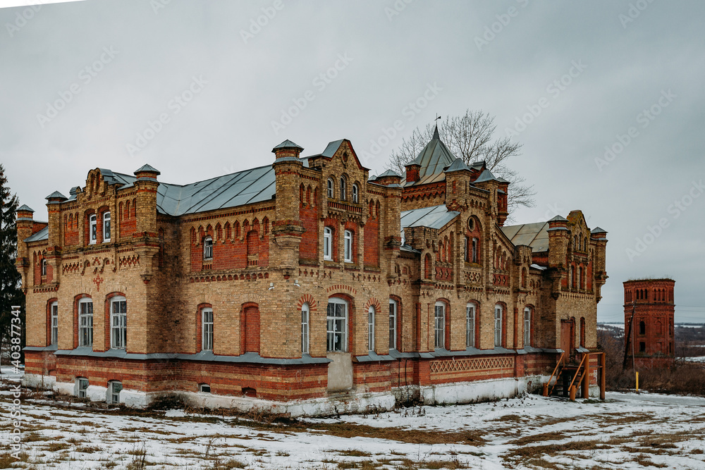 Old abandoned ruined mansion in Gothic style in Kursk oblast, Russia