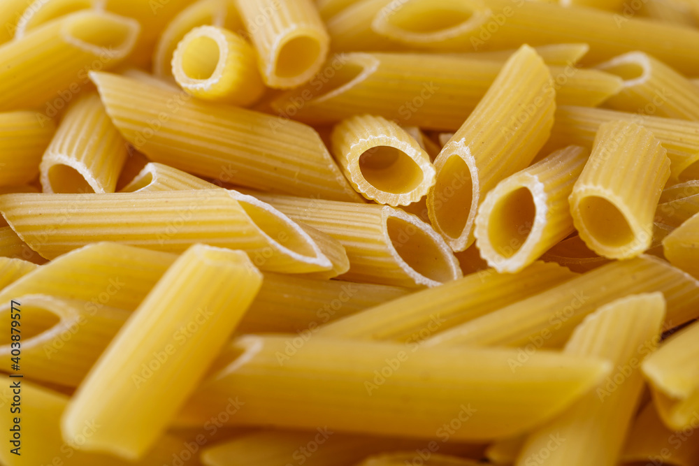Macaroni, pasta, made by durum wheat.Pasta background. Testure for design. Macaroni, pasta, made by durum wheat.Pasta background. Testure for design.