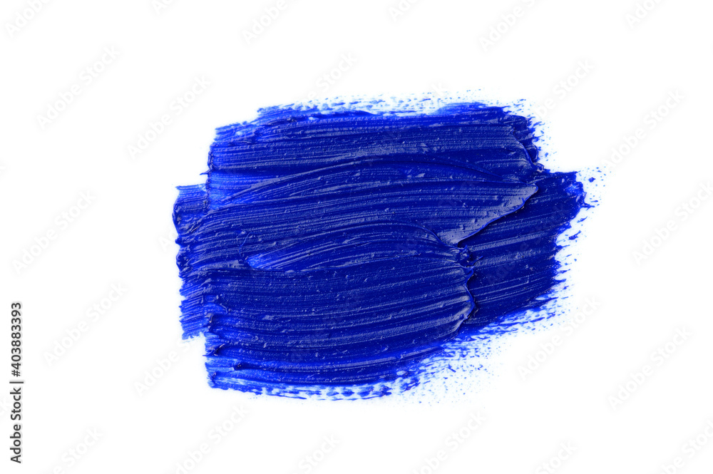 smear of blue acrylic paints on a white isolated background, macro photography