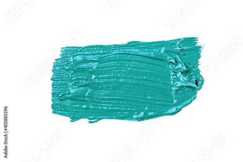 a smear of turquoise acrylic paints on a white isolated background, macro photography
