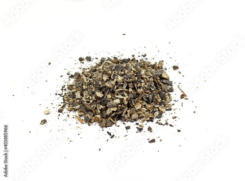Comfrey herb root used in alternative and chinese herbal medicine, is used as a salve and can treat skin ailments. On white background. Symphytum officinale.