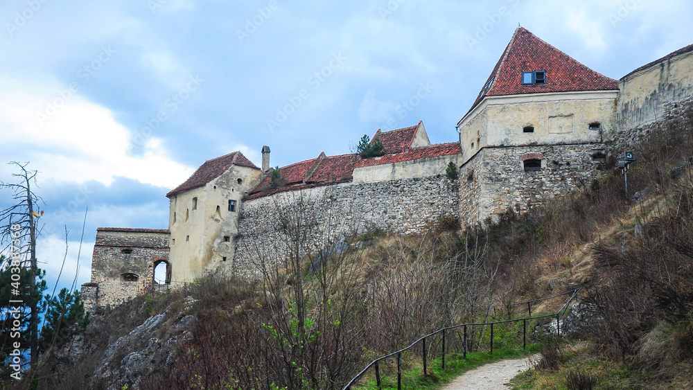 Rasnov fortress - a well preserved medieval fortified citadel, surrounded by stone walls, located in Transylvania, Romania.
