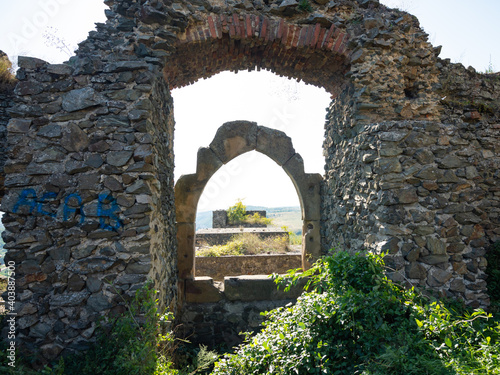 The old ruins of the entrance in Soimos medieval citadel. Romania. 